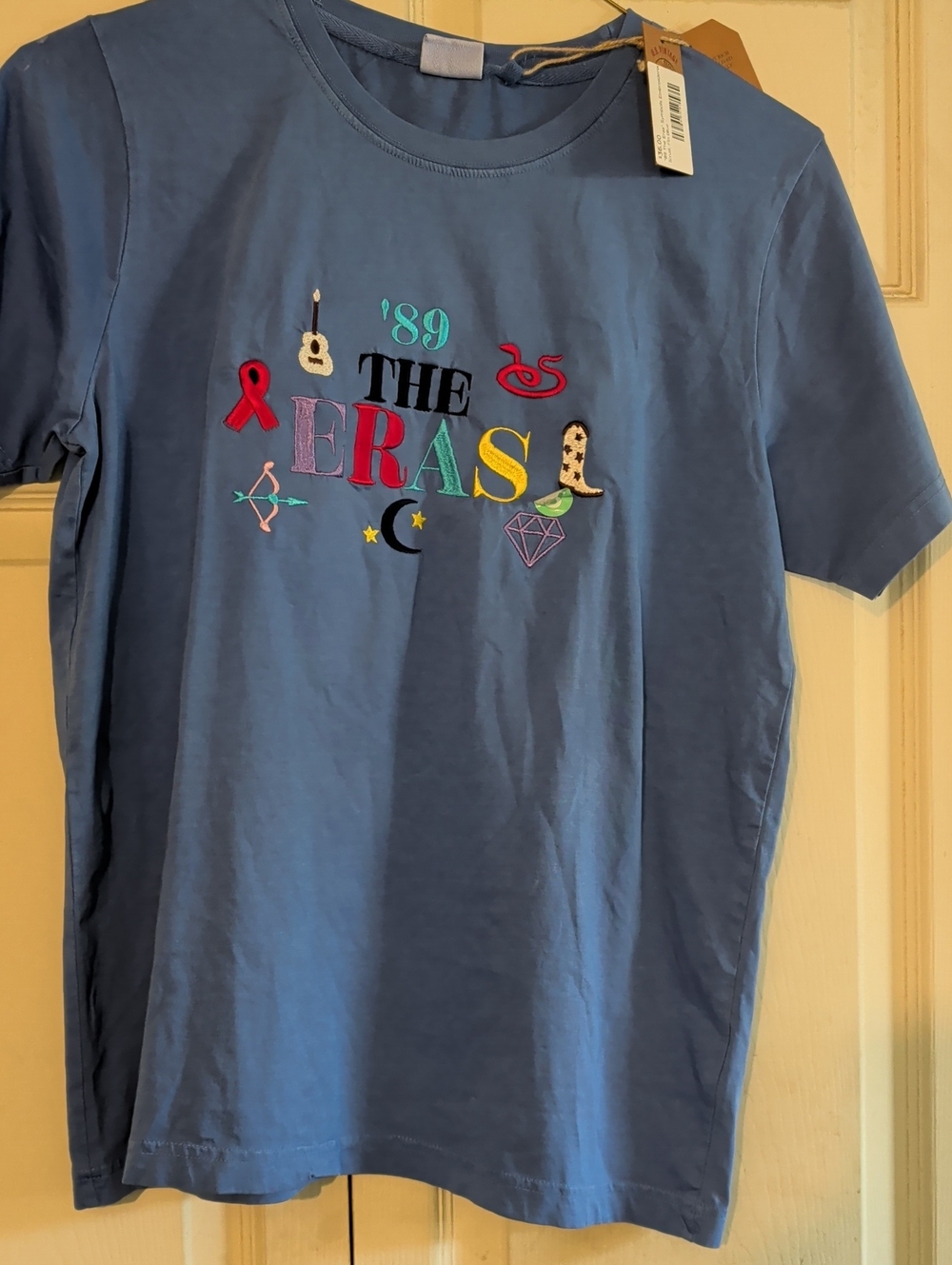 Women's Blue Short Sleeve Graphic Tee - 'The Eras' Embroidered Design